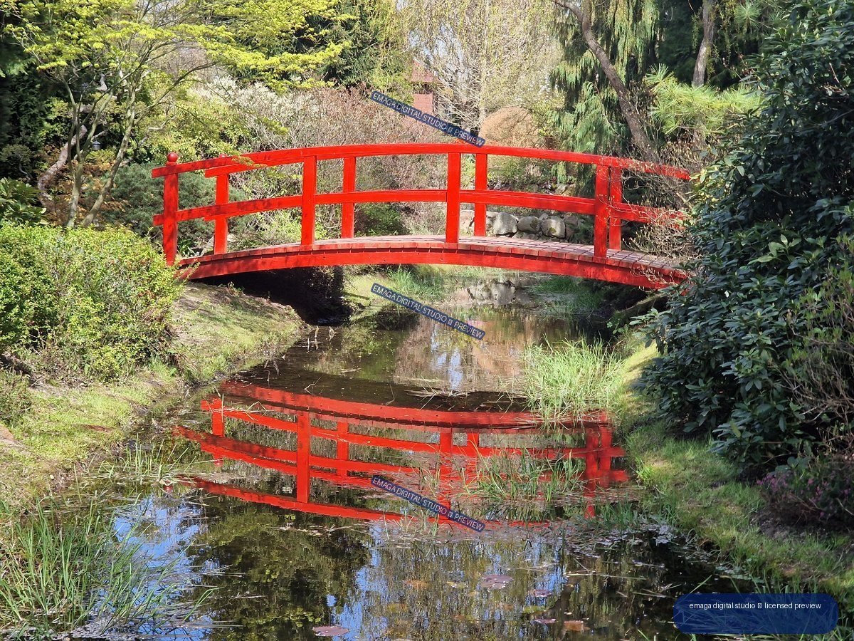 Red Arched Footbridge Reflected in a Garden Pond — Hortulus Gardens, Dobrzyca