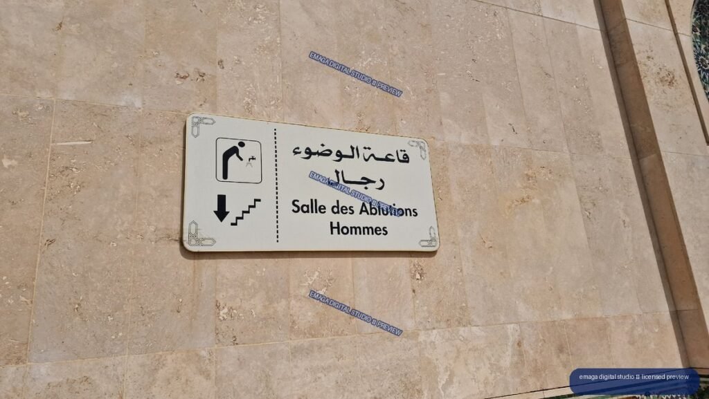 Men's Ablution Room Sign on Tiled Wall in Casablanca, Morocco