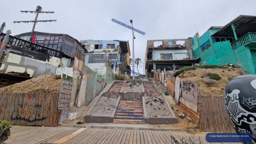 Steep Stairway Between Colorful Hillside Buildings Under Gray Sky — Tijuana, Mexico