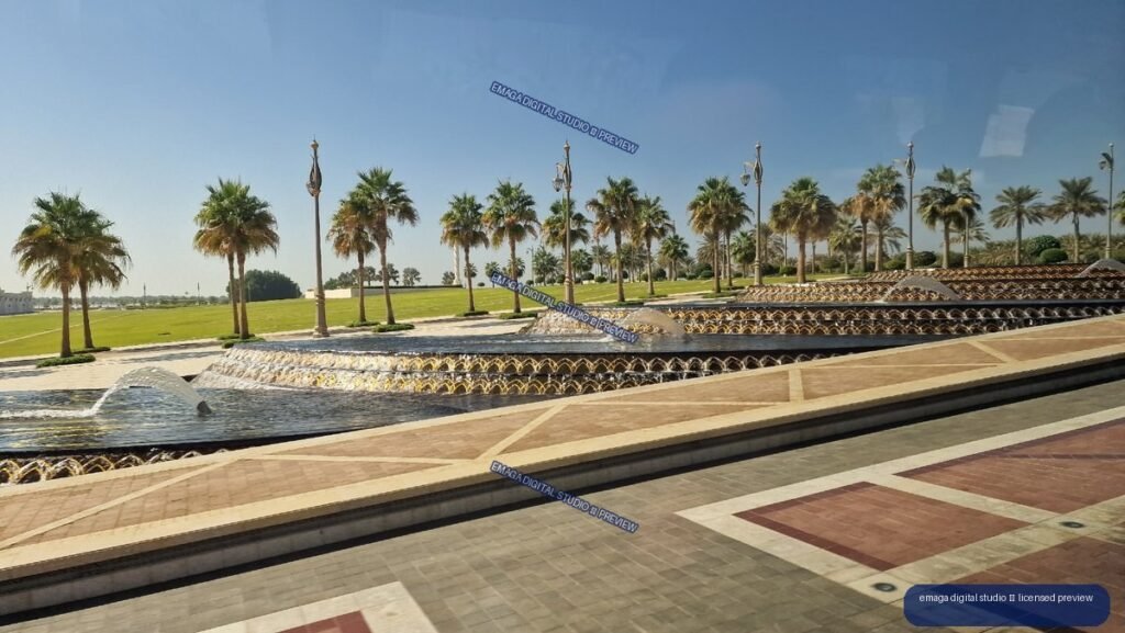 Tiered Fountain and Palm-Lined Grounds in Bright Sunlight — Qasr Al Watan, Abu Dhabi