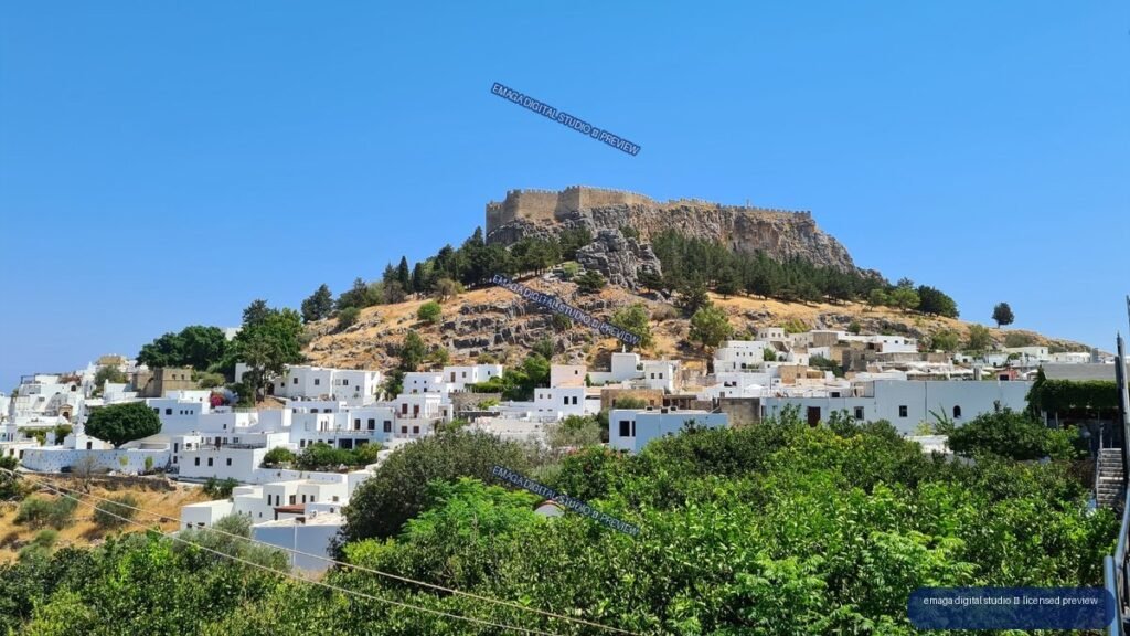 Hilltop Fortress Above a Whitewashed Mediterranean Village — Lindos, Rhodes