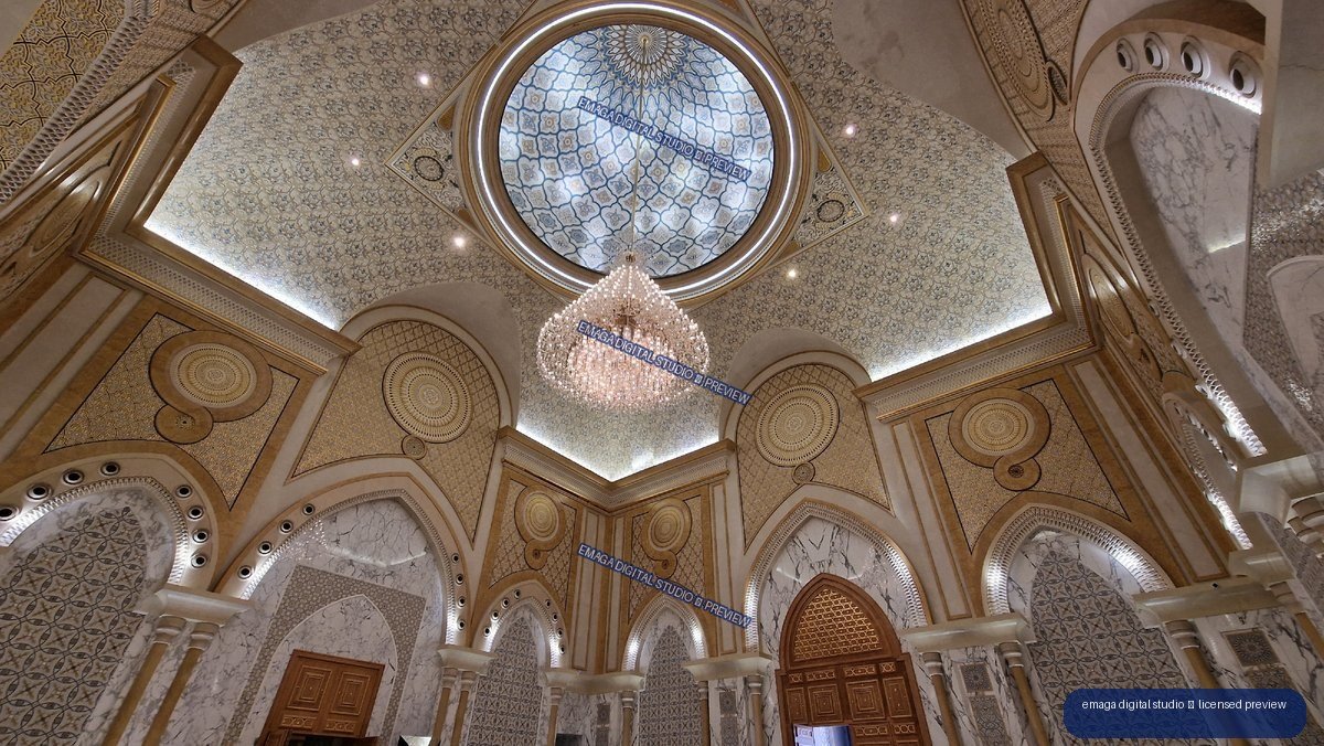 Ornate domed interior with chandelier and geometric decoration