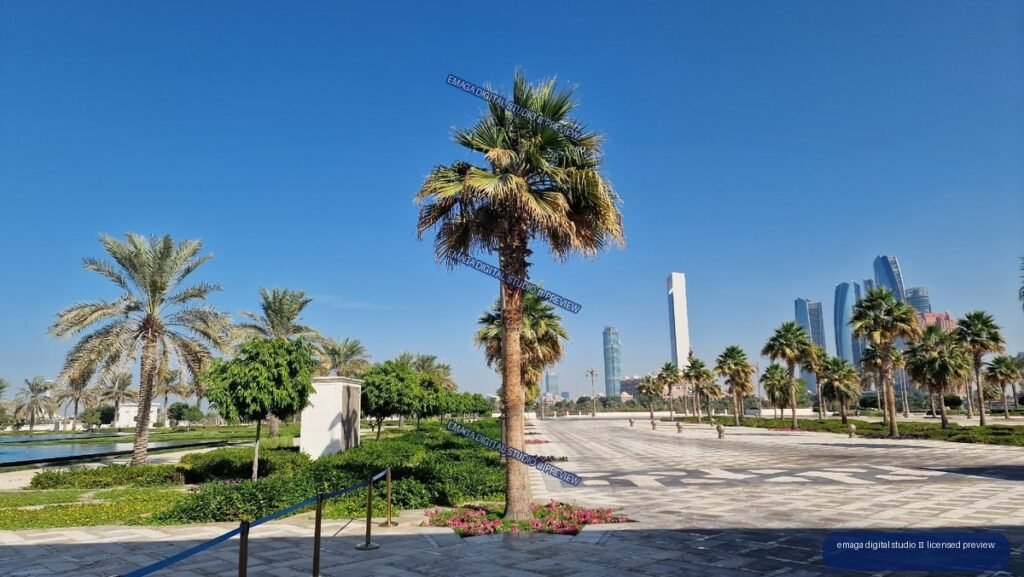 Landscaped Palm Plaza with Modern City Skyline Under Blue Sky — Qasr Al Watan, Abu Dhabi
