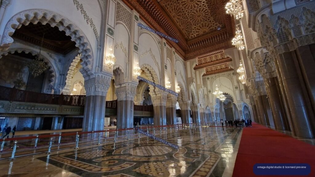 Ornate mosque interior with red carpet in Casablanca, Morocco
