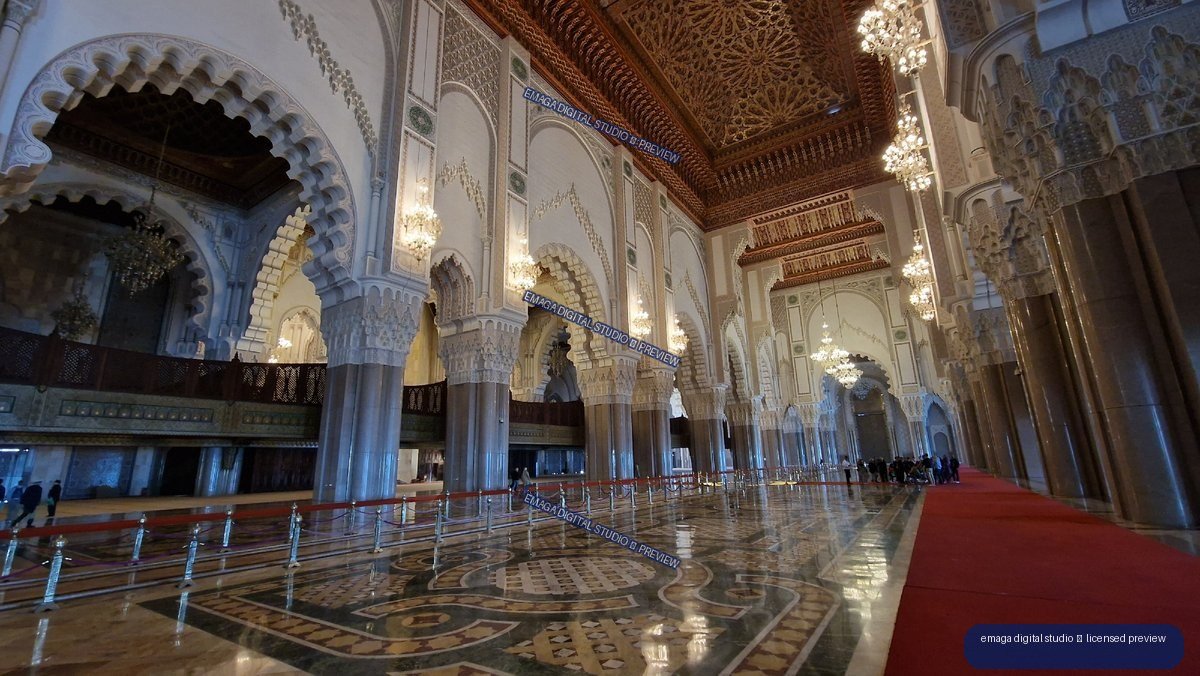 Ornate mosque interior with red carpet in Casablanca, Morocco