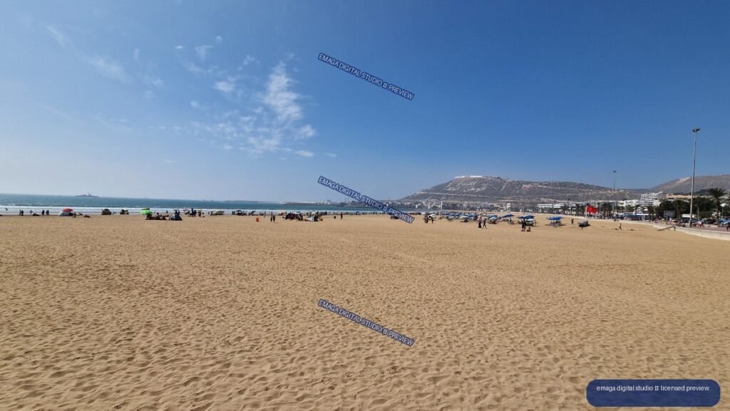 Wide Sandy Beach and Coastal Hills in Agadir, Morocco