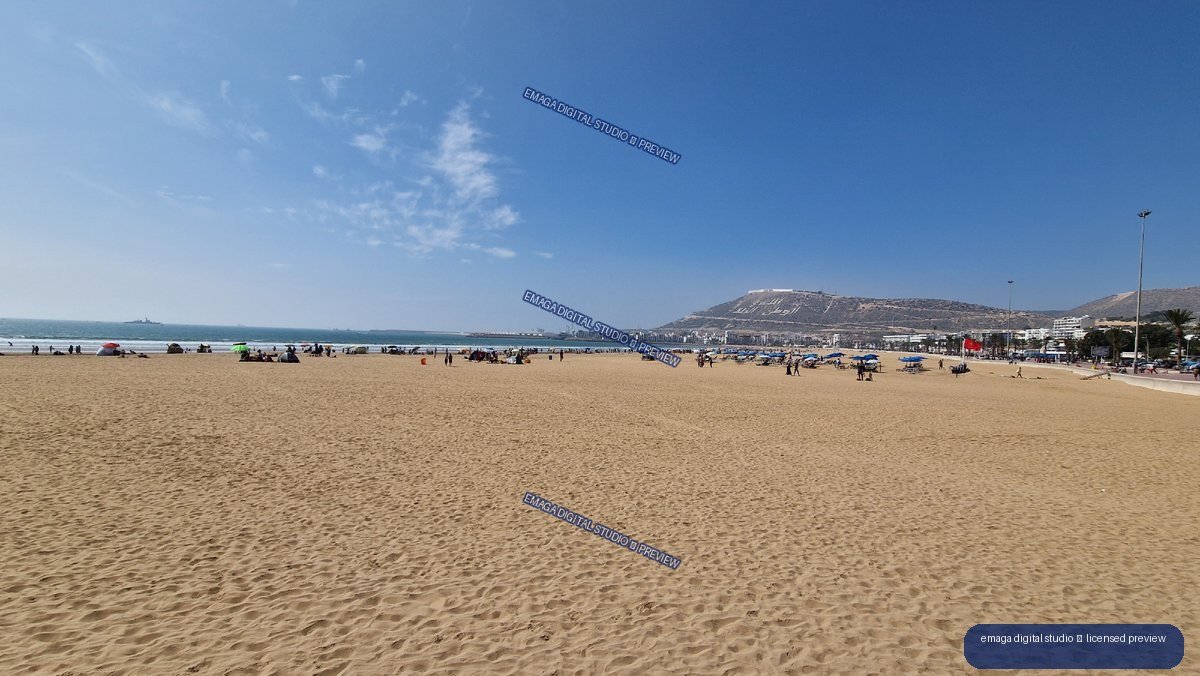 Wide Sandy Beach and Coastal Hills in Agadir, Morocco