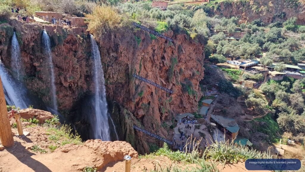 Ouzoud Waterfalls Morocco with Red Cliffs and Surrounding Trees