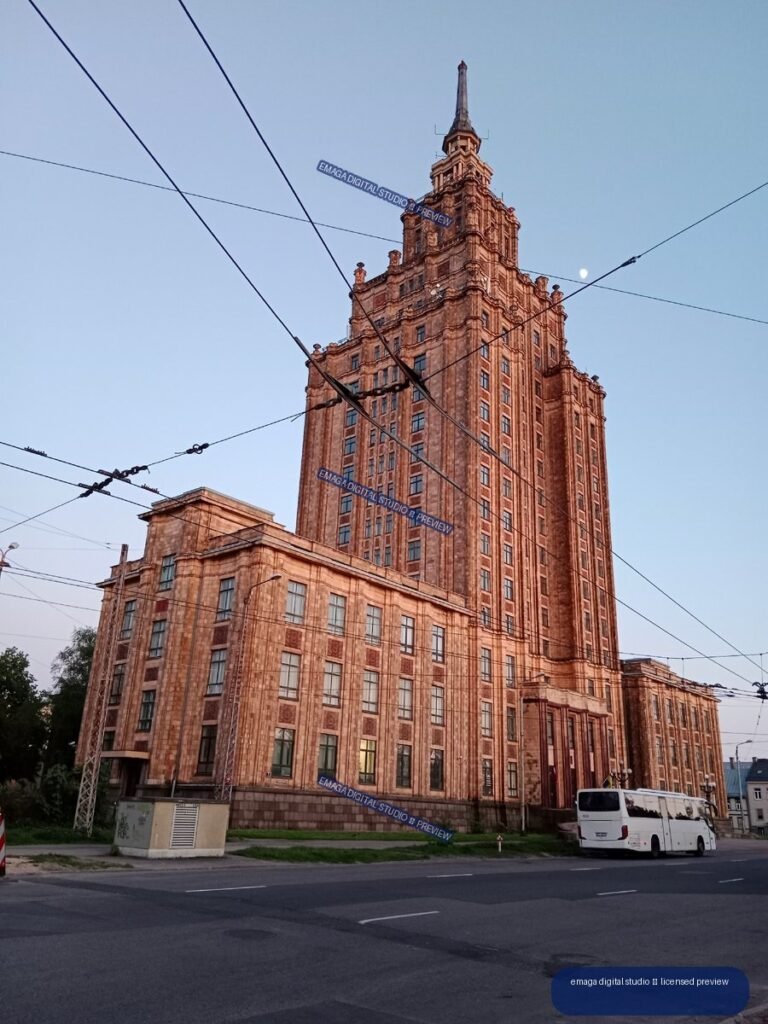 Ornate Tower Building and Overhead Tram Wires in Riga, Latvia