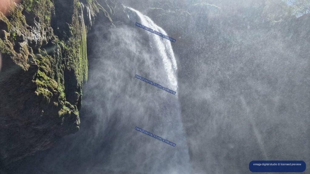 Misty Ouzoud Waterfalls in Morocco with Mossy Cliffs