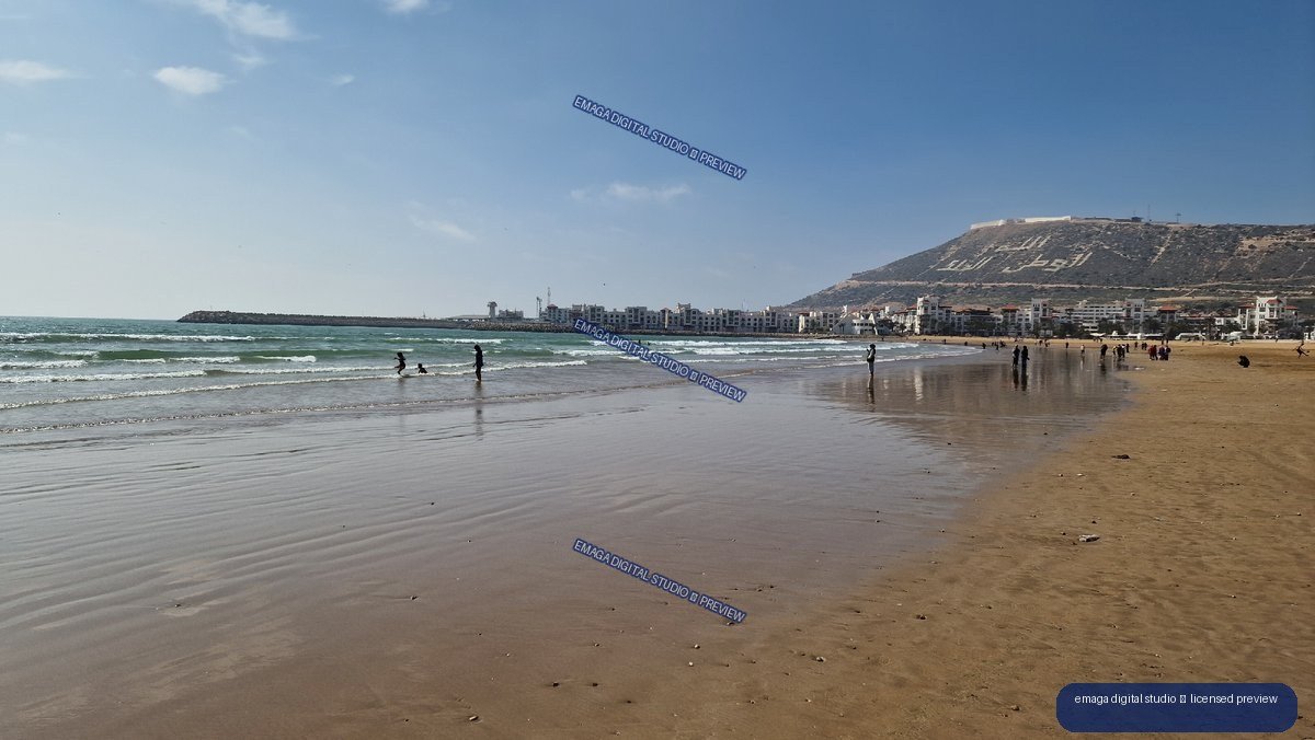 Wide Sandy Beach and Coastal Cityscape in Agadir, Morocco