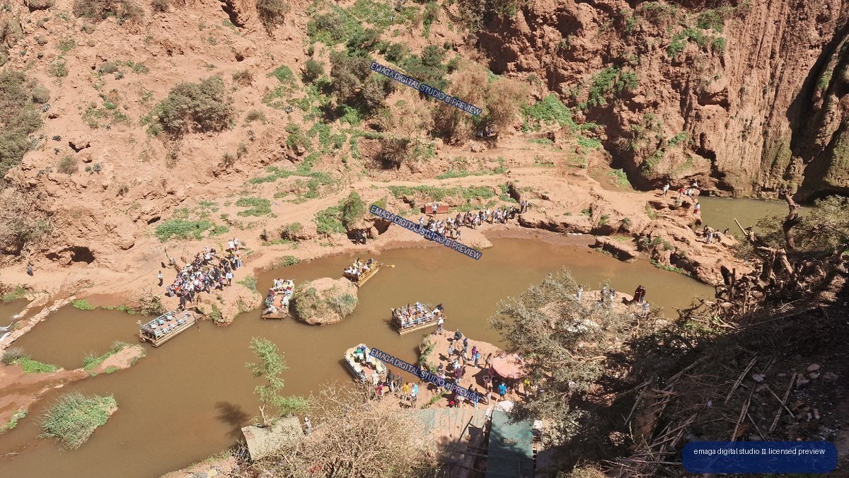 Ouzoud Waterfalls Morocco Canyon Pool with Boats and Visitors