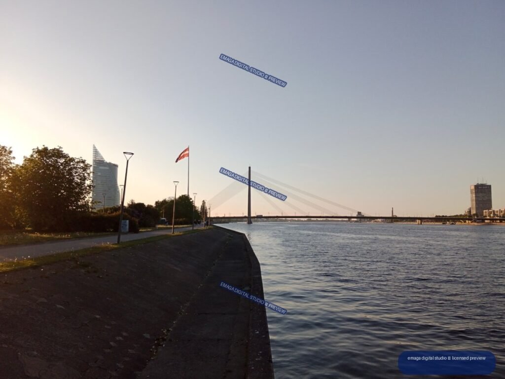 Riga, Latvia Riverside View with Cable-Stayed Bridge at Sunset