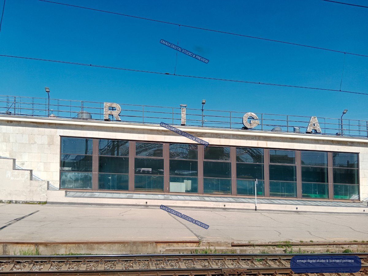 Riga, Latvia railway-side building facade beneath blue sky
