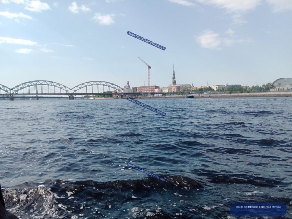 Riga, Latvia Waterfront Skyline and Arched Bridge Over the Daugava