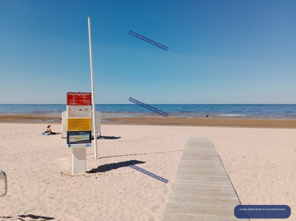 Sandy seaside beach with boardwalk in Jurmala, Latvia
