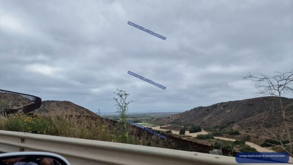 Overcast Hillside and Border Fence Landscape in Tijuana, Mexico