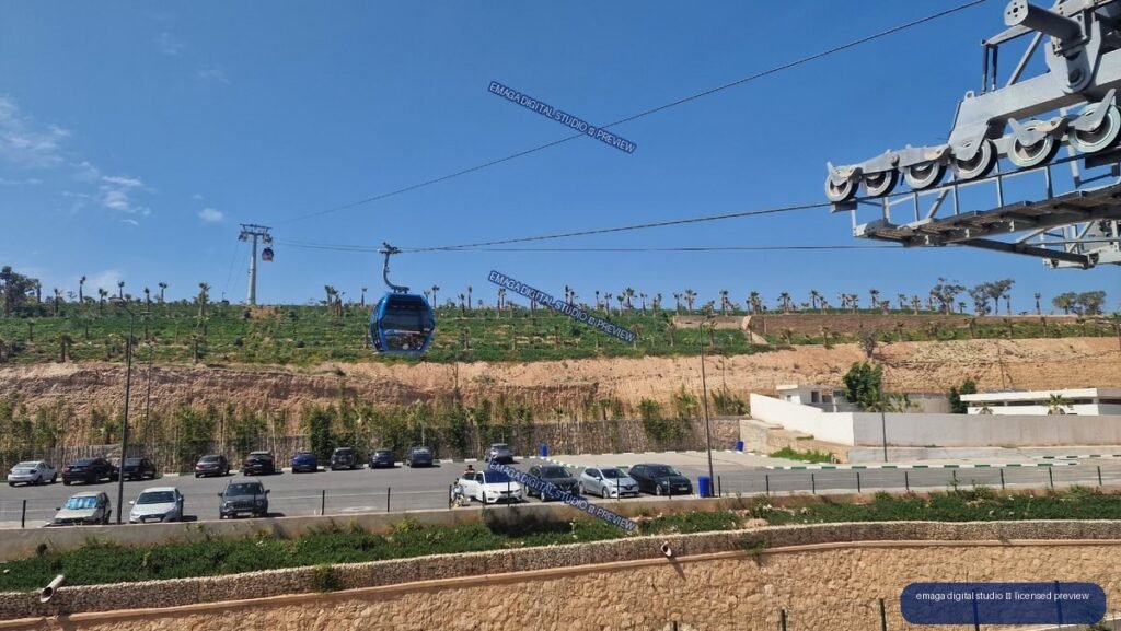 Cable Car and Palm-Covered Hillside in Agadir, Morocco