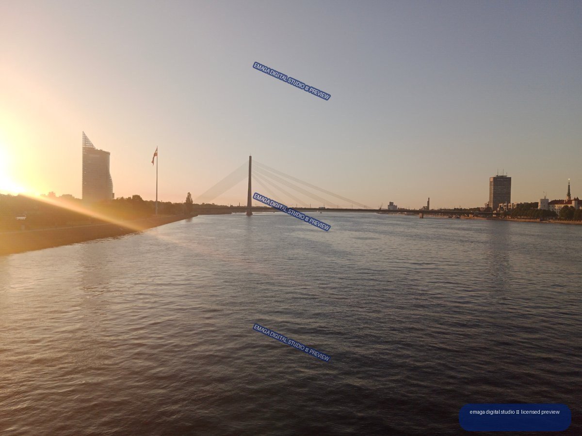Sunset over the Daugava River and Bridge in Riga, Latvia