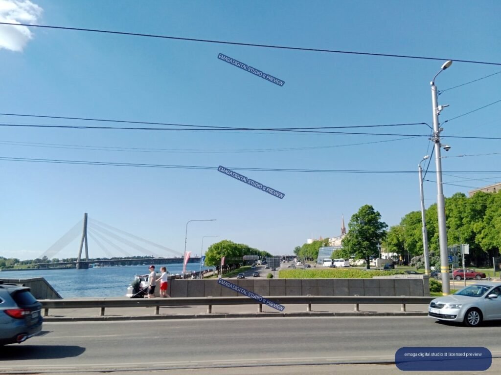 Sunny Urban Waterfront and Cable-Stayed Bridge in Riga, Latvia