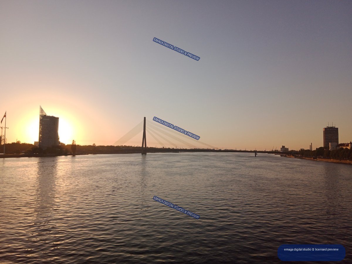Sunset over the Daugava River and Bridge in Riga, Latvia