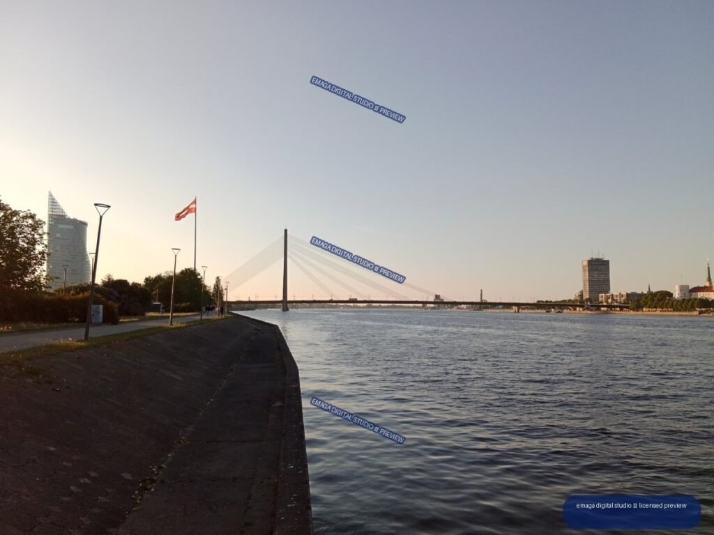 Riga, Latvia Riverside View with Cable-Stayed Bridge at Sunset