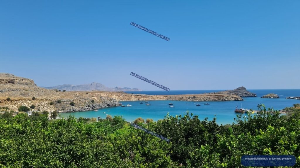 Coastal Bay and Rugged Landscape in Lindos, Rhodes, Greece