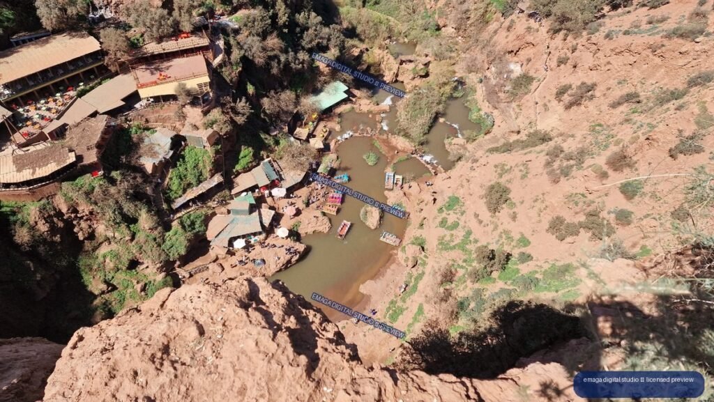 Aerial View of Rocky Pools and Riverside Cafés at Ouzoud Waterfalls, Morocco