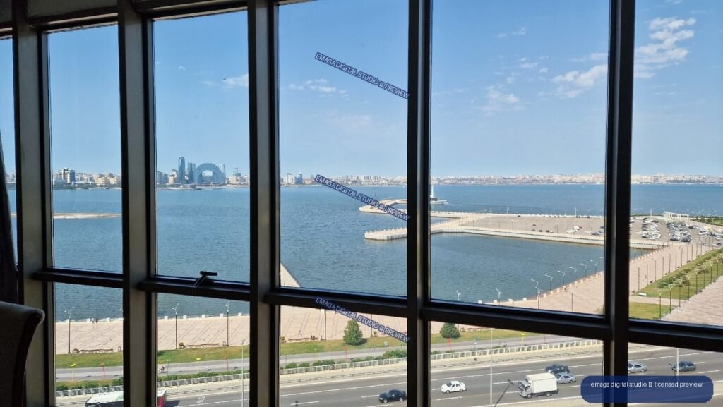 Waterfront and Baku skyline viewed through large windows, Azerbaijan