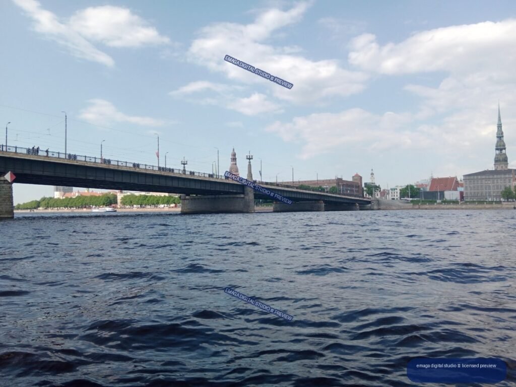 Riga, Latvia Waterfront View with Bridge and Historic Skyline