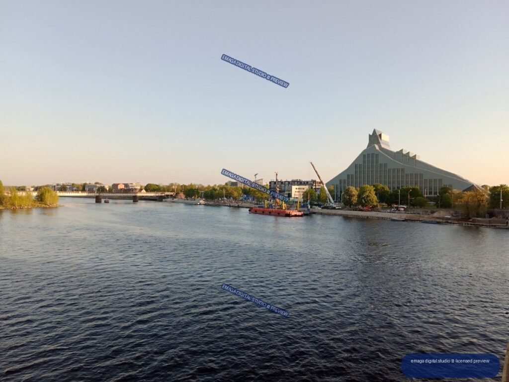 Riverside cityscape with modern angular building in Riga, Latvia