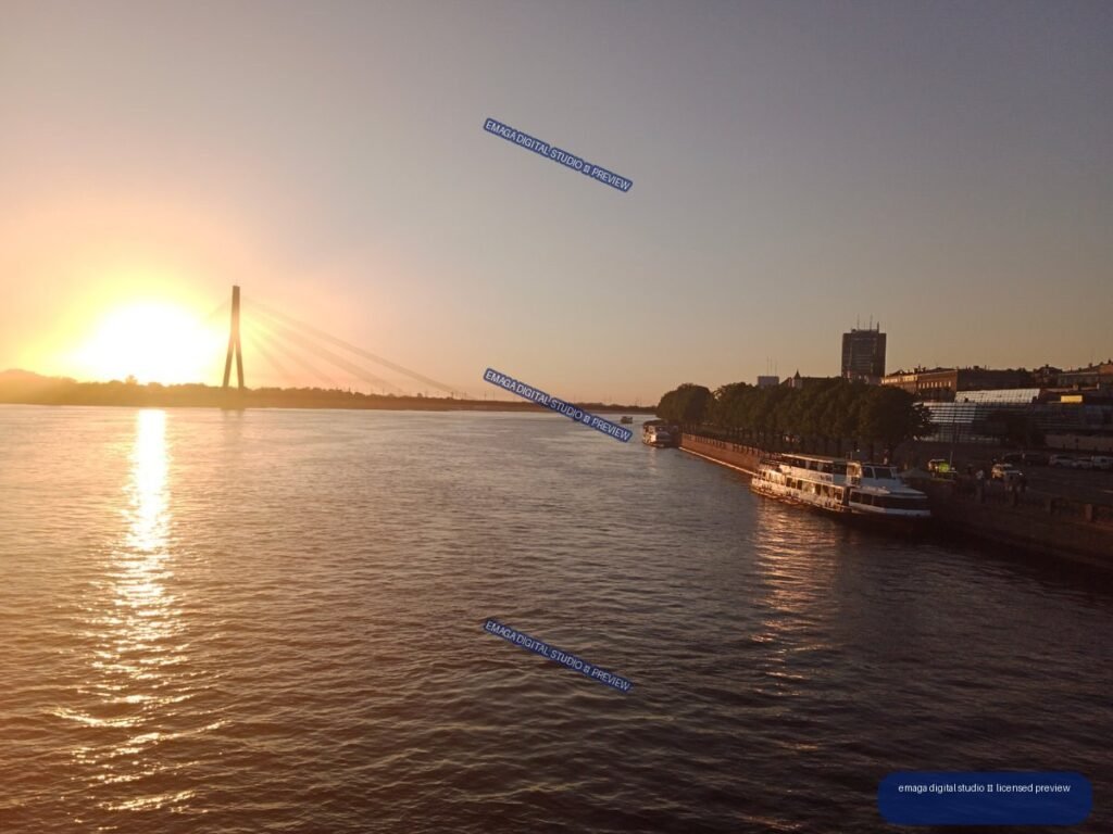 Sunset over the Daugava River and bridge in Riga, Latvia