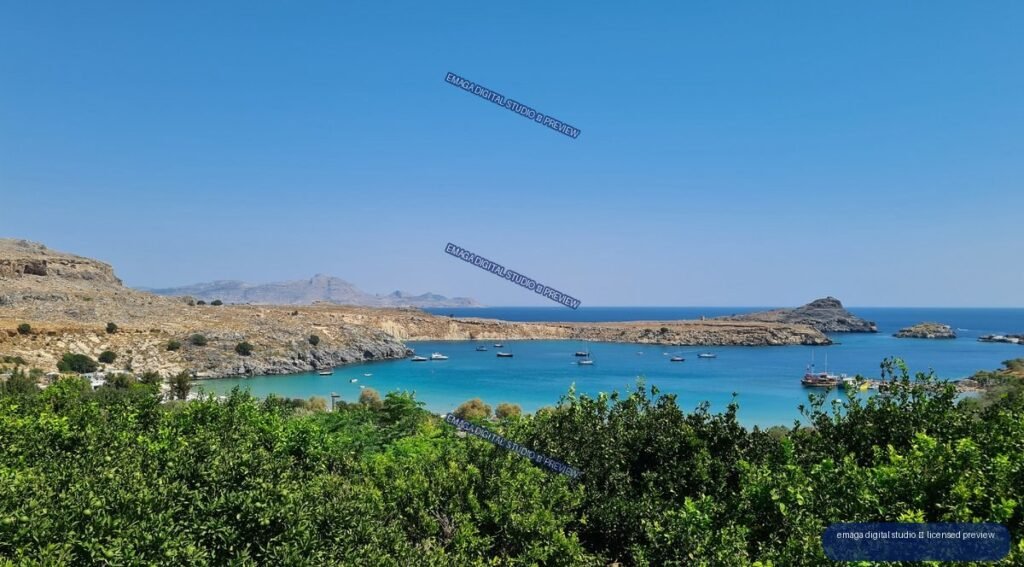 Turquoise Mediterranean-Style Bay with Boats and Citrus Trees