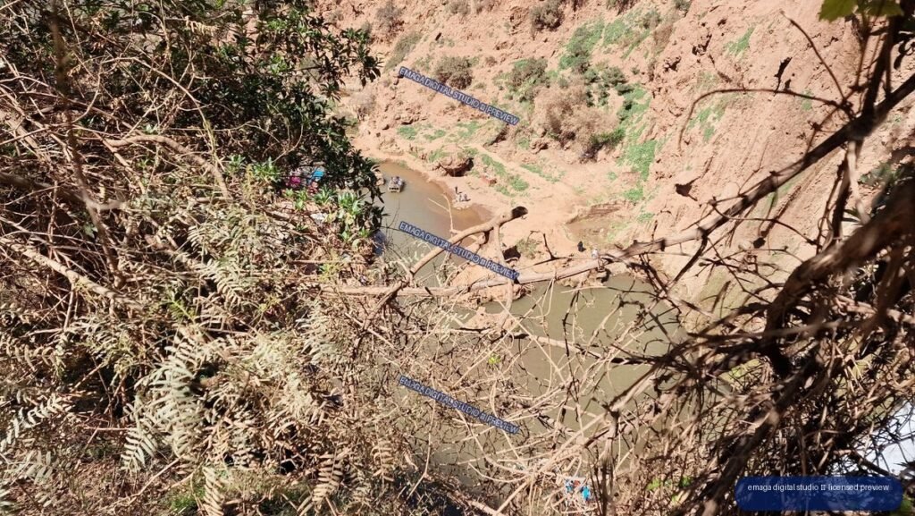 Rocky Canyon and River Viewed Through Trees at Ouzoud Waterfalls, Morocco