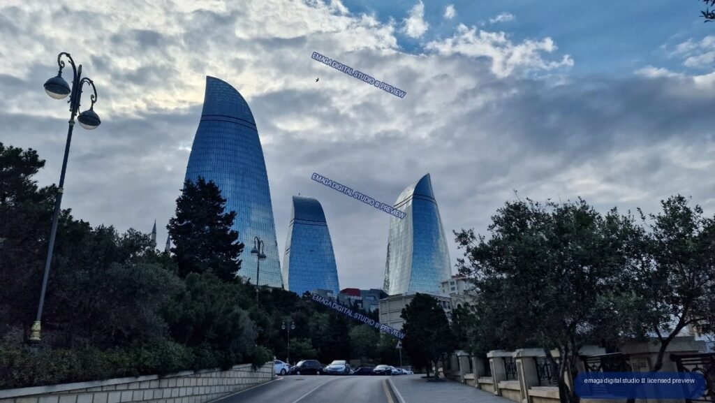 Curved Glass Towers and Tree-Lined Street in Baku, Azerbaijan