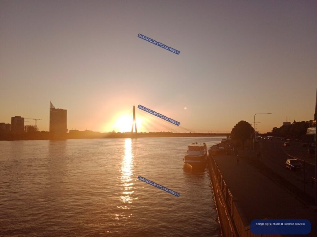 Sunset over the Daugava River and bridge in Riga, Latvia