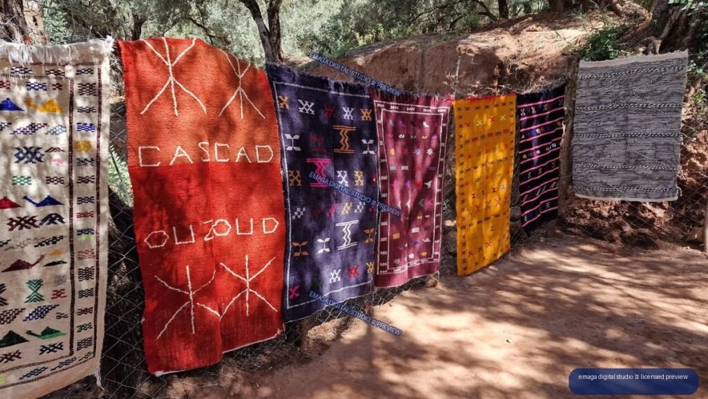 Colorful Berber Rugs Displayed at Ouzoud Waterfalls, Morocco