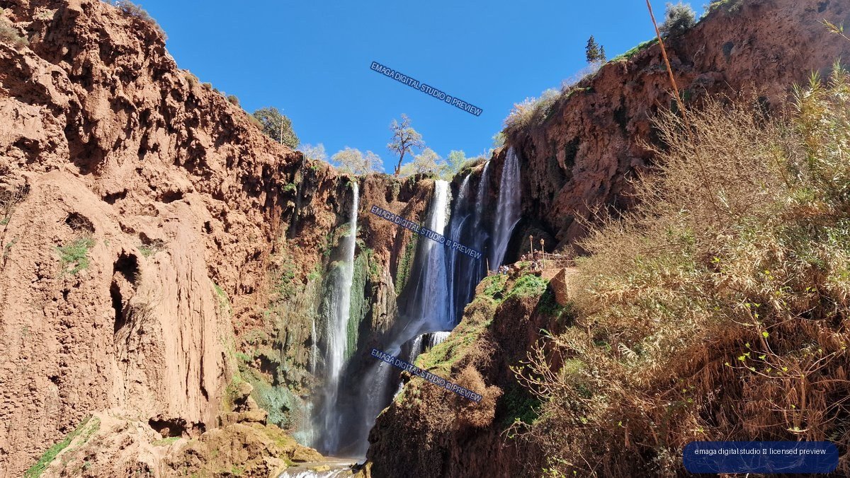 Ouzoud Waterfalls in Morocco Between Red Cliffs and Greenery