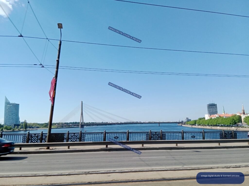 Riga, Latvia Waterfront View with Bridge and River Cityscape