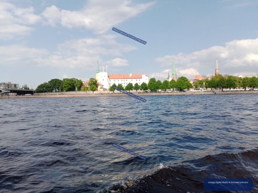 Riga, Latvia Waterfront with Historic Buildings and Church Spires