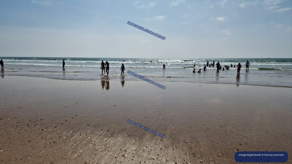 Beachgoers and Atlantic waves on the shore of Agadir, Morocco