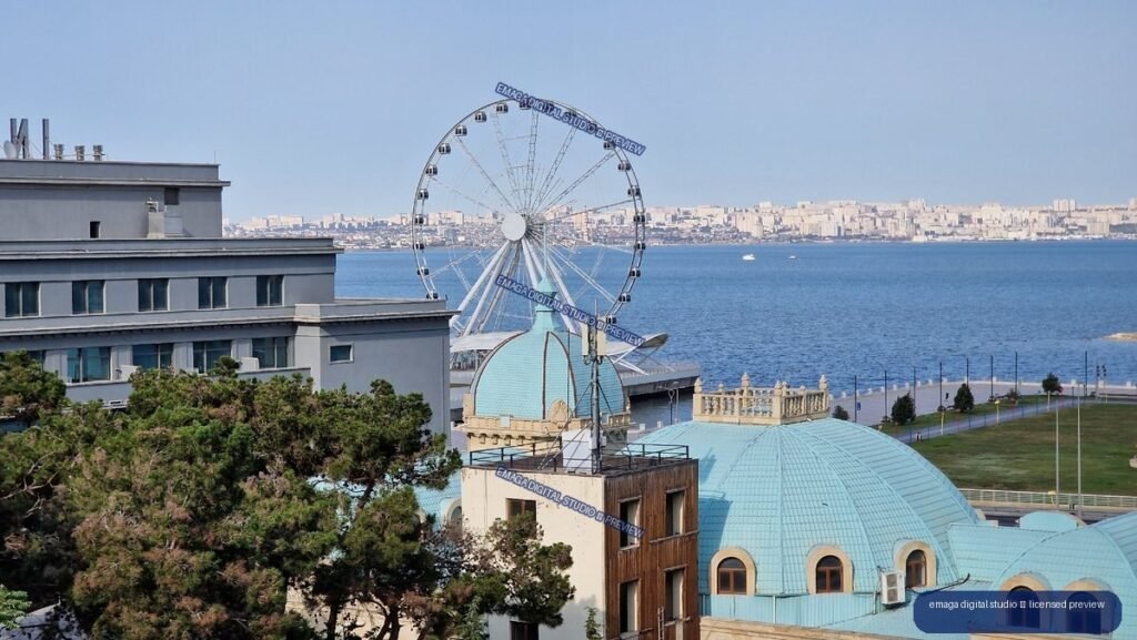 Waterfront Ferris wheel and cityscape in Baku, Azerbaijan