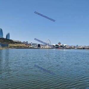 Baku, Azerbaijan Waterfront Skyline Across Calm Blue Water