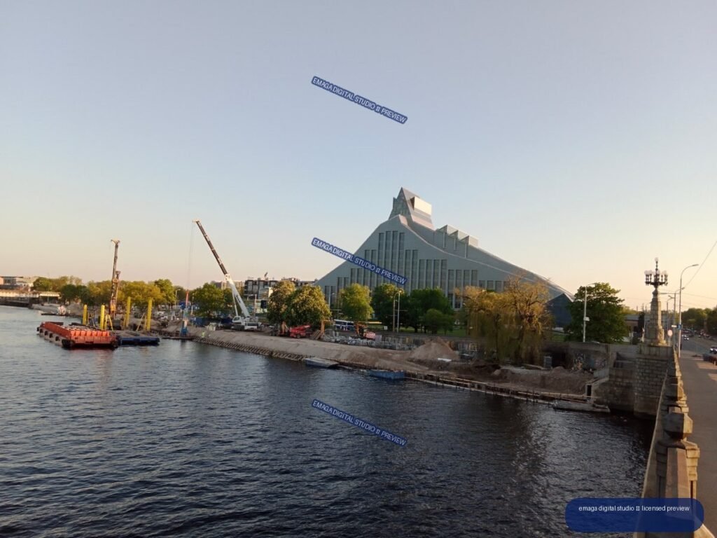 Riverside construction and modern building in Riga, Latvia