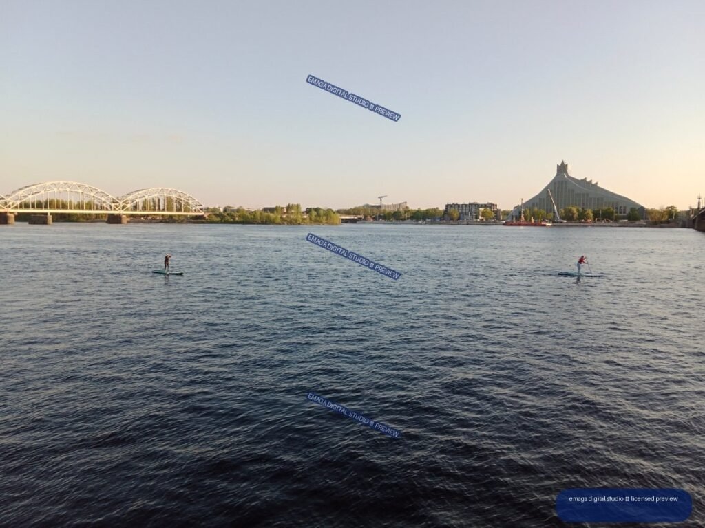 Riga, Latvia River Panorama with Paddleboarders and Bridges