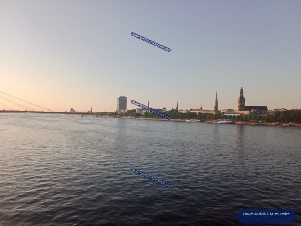 Riga, Latvia Skyline Across the River at Golden Hour