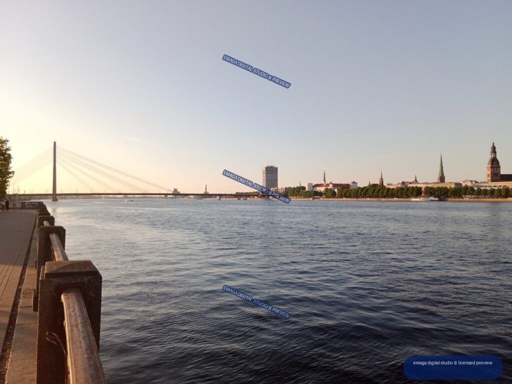 Riga, Latvia Riverside View with Bridge and Historic Skyline