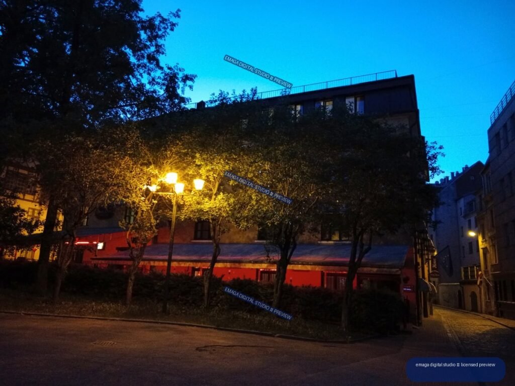 Twilight Street Scene with Lit Building in Riga, Latvia