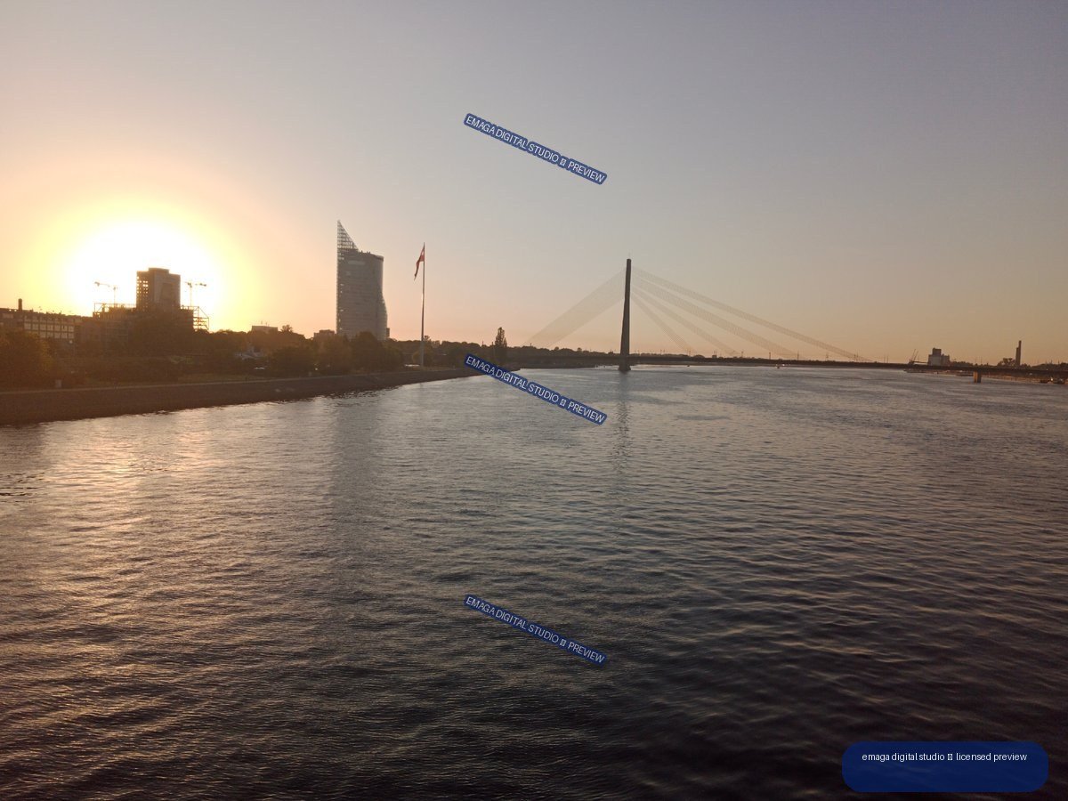 Sunset over the Daugava River and Bridge in Riga, Latvia